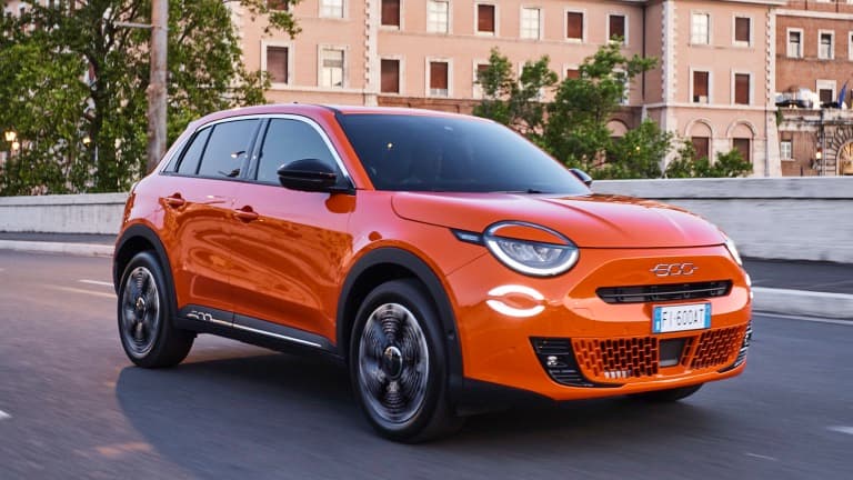 Fiat 600e electric SUV exterior, front three-quarter view.