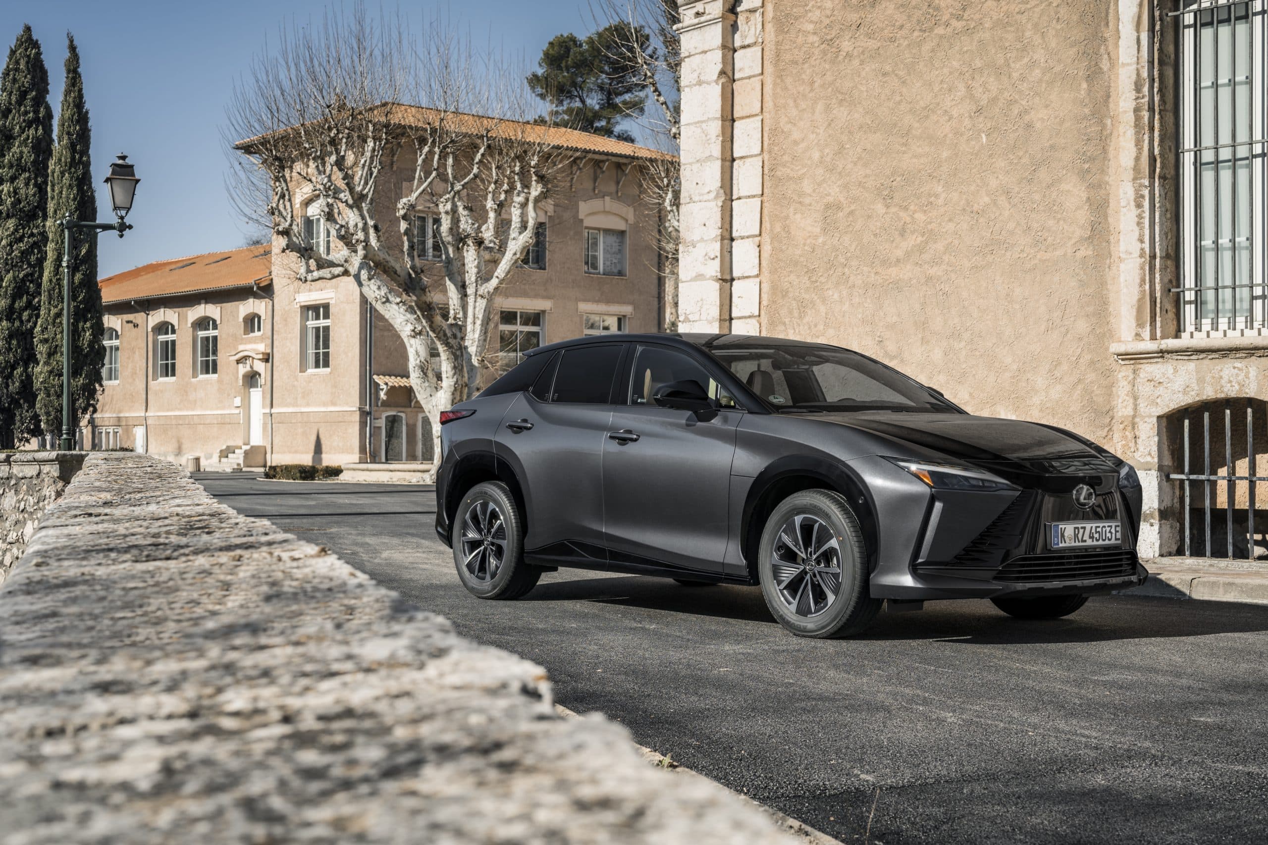 Lexus RZ 450e DIRECT4 electric crossover exterior, front three-quarter view.