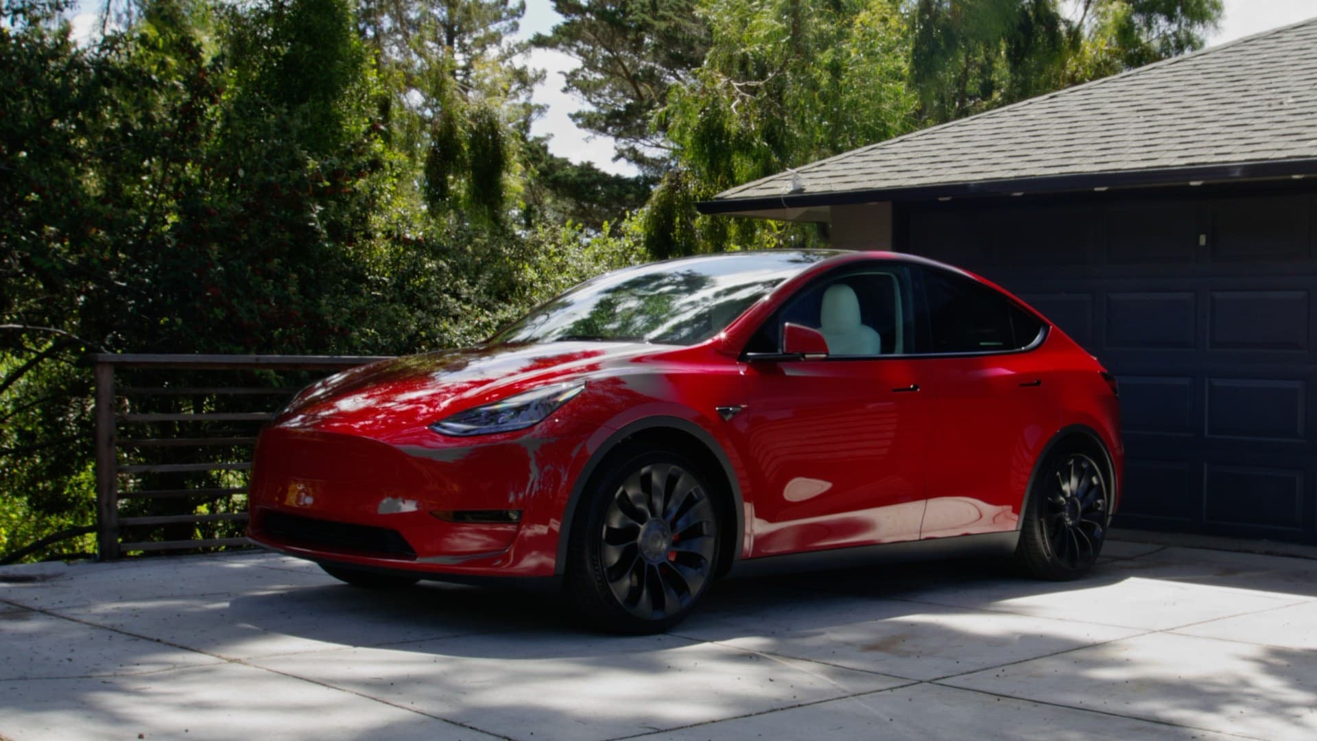 Tesla Model Y Long Range AWD electric crossover exterior, front three-quarter view.